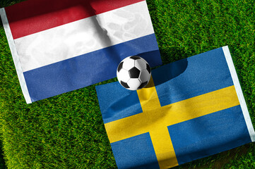 Fototapeta premium Netherlands vs Sweden, national flags before world championship Group F group stage match, football on green pitch with goal in the background, Houston, USA, June 20, 2026