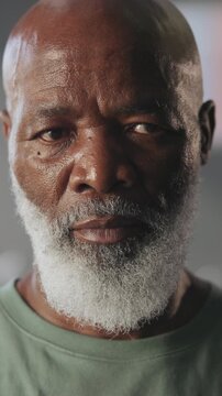 Serious, black man and face with fitness determination for health and wellness in gym. Portrait, mature or active male person with commitment, memory or nostalgia for physical activity or workout
