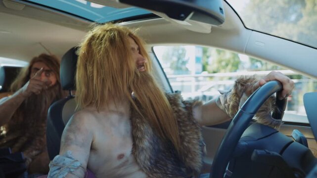 A caveman comically drives a modern car, leading to a funny and amusing adventure