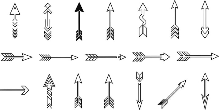Collection of various arrows on plain surface