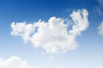 Fototapeta premium Beautiful white clouds in the blue sky on a clear sunny day.