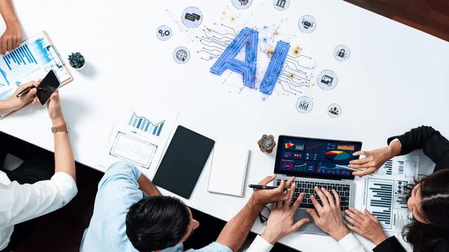 A team collaborates in a modern workspace, exploring artificial intelligence concepts through data visualization and innovative strategies on their laptops. Raster
