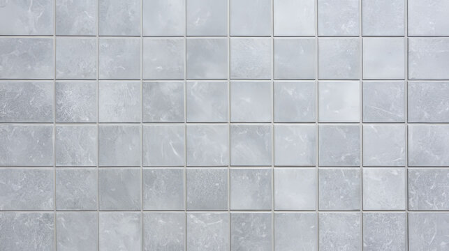 Gray tile wall clean condition with grid line texture in top view. Interior toilet wall decor by tile, Square shape of tile made from ceramic material covering wall, For texture or background etc.