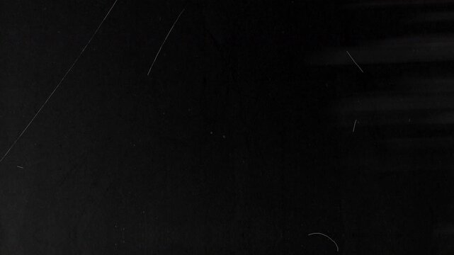 Transparent film overlay with alpha channel in Apple ProRes 4444, isolated effect for compositing, subtle vintage texture, seamless loop, ready for editing