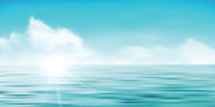 Bright blue sky with soft white clouds over calm ocean water