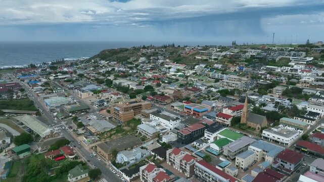 Pan left aerial view of Mossel Bay with St. Peter's Anglican Church. South Africa.