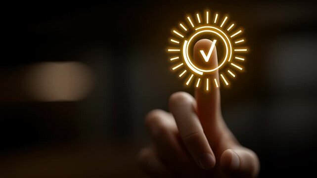 Finger pressing approve button with glowing checkmark icon symbolizing confirmation success digital technology hand concept close up dark background