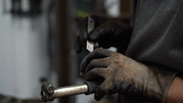 Auto mechanic clean metal auto part
