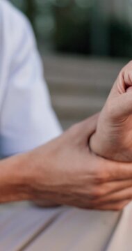 Wrist pain, stretching or hands outdoor with massage, burnout or joint inflammation in carpal tunnel. Ache, tendinitis and person with blood circulation, muscle strain or arthritis in health risk.