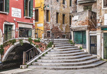 Venice Italy canals and gondola cityscape. Historic architecture and waterfront reflections create an iconic European travel destination. © Chris Chambers