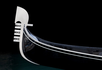 Venice Gondola bow detail on dark water in Venice, Italy, featuring the iconic Ferro and traditional canal boat design. © Chris Chambers