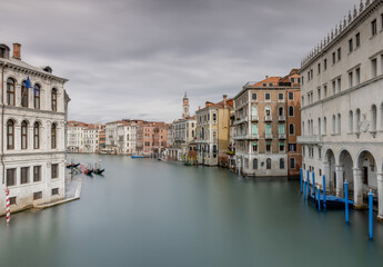 Obraz premium Venice Italy canals and gondola cityscape. Historic architecture and waterfront reflections create an iconic European travel destination.