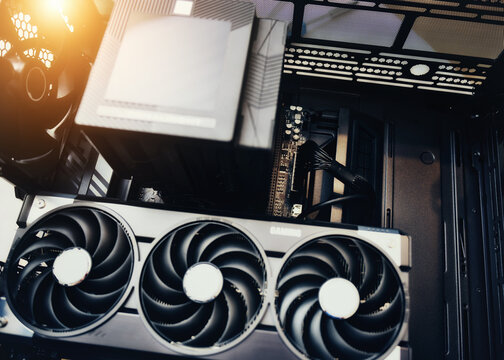 Interior of a powerful gaming PC with high-end GPU and CPU air cooler