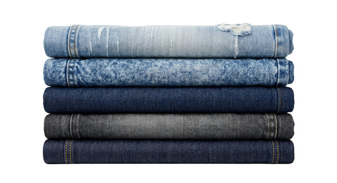 Stack of folded blue and grey denim jeans
