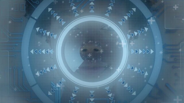 Female subject staying still in clinic, grid appearing and scanning ring mapping face for scan