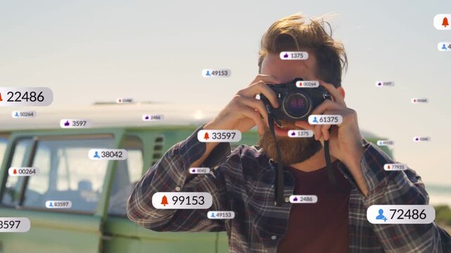 Male camera operator raising DSLR social badges clustering over lens then fading while shooting van