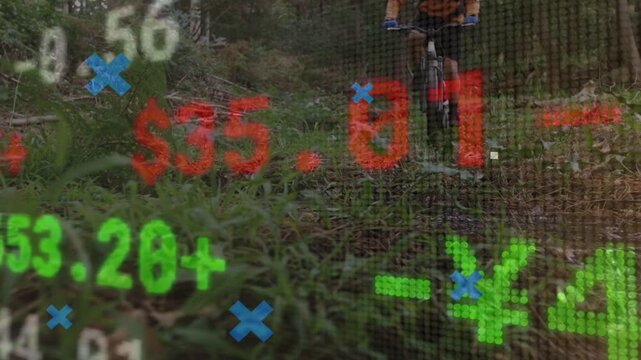 Male cyclist pedaling forest trail, camera rising causing AR tech charts and HUD monitoring speed