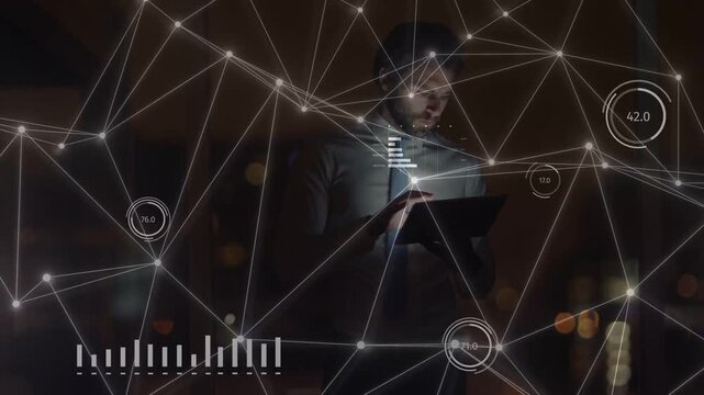 Business analyst tapping tablet in office, activating HUD network and updating charts for decisions
