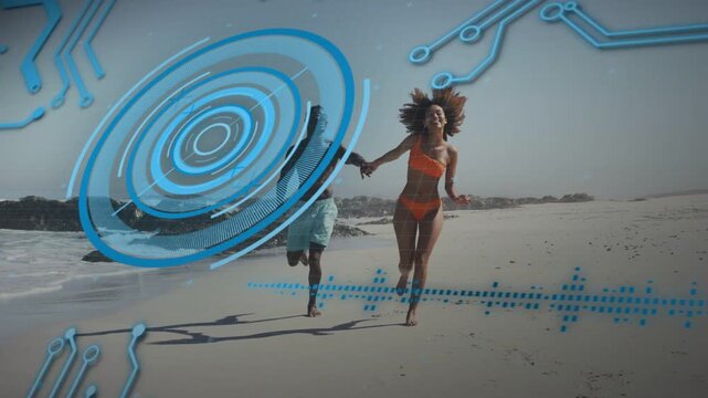 Man and woman holding hands breaking into run on beach, blue HUD circle obscuring left, marketing