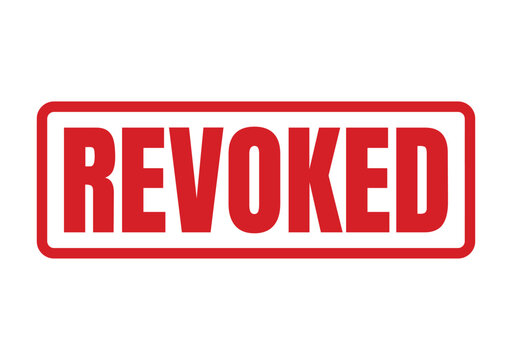 A bright red inked rubber stamp showing the word revoked for official legal document cancellation
