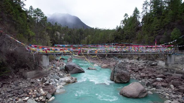 Drone view Parlung Zangbo river running along G318 or China National Highway 318 between Bomi and Baxoi County, Tibet, China, beautiful turquoise water in valley, 4k real time footage travel concept.