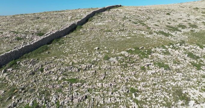 Rugged landscape with dry stone walls near Ba&scaron;ka, Krk Island, Croatia