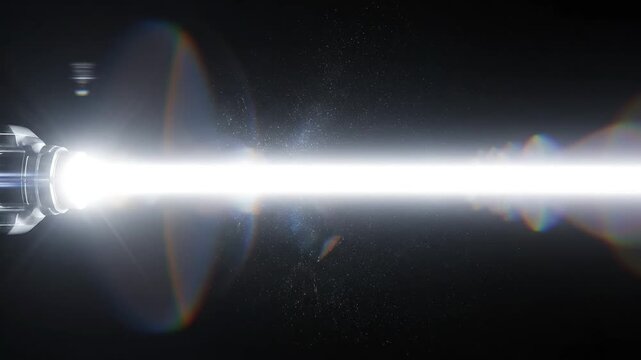 Beam of light from device in dark space for creative digital media and visual arts