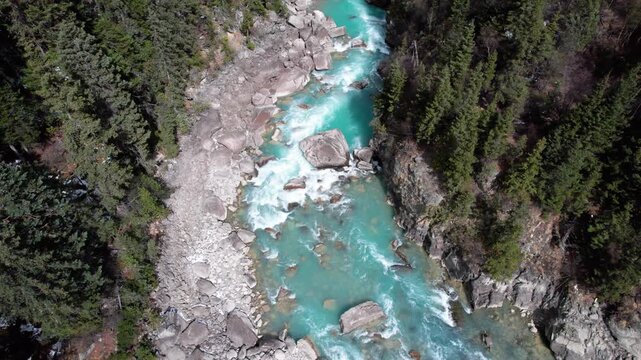 Drone view Parlung Zangbo river running along G318 or China National Highway 318 between Bomi and Baxoi County, Tibet, China, beautiful turquoise water in valley, 4k real time footage travel concept.