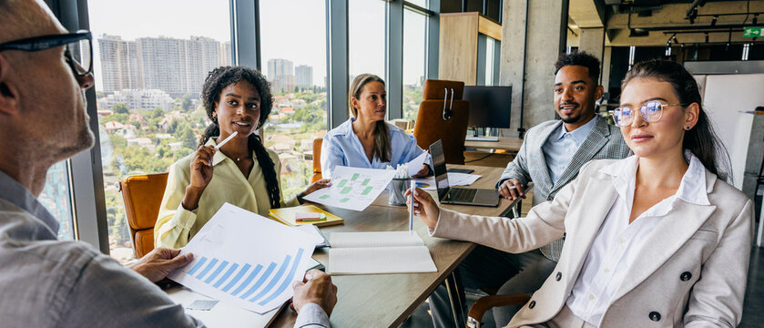 Executives finalize contract during professional handshake meeting