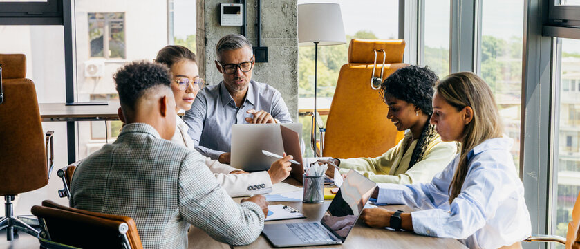 Intense teamwork finalizing project deliverables rapidly