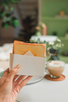 Savoring delicious toast in a cozy  bright food photography inviting atmosphere