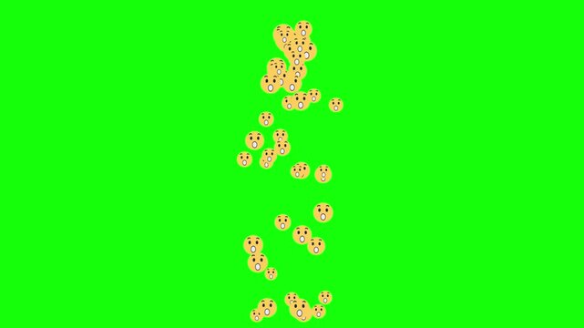 Yellow smiley faces fall down a green screen