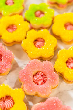 Close-Up of Yellow and Pink Sandwich Cookies