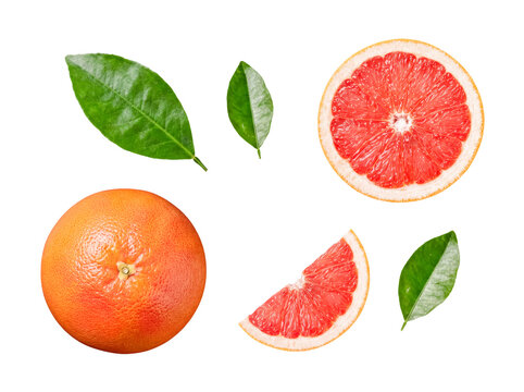 Assortment of fresh pink grapefruits, including whole, halved, and quartered pieces.