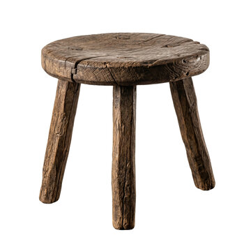 Rustic three legged wooden stool with weathered texture. Antique furniture piece.