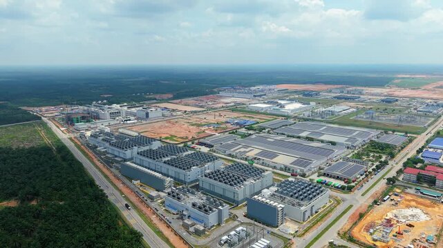 Aerial Drone Tracking Shot of Hyperscale Data Center Campus with Rooftop Cooling, Malaysia