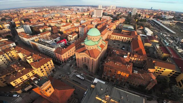 FPV Aerial drone shot of The Historic City Center Of Bologna, Italy. Parrocchia Sacro Cuore Gesu church