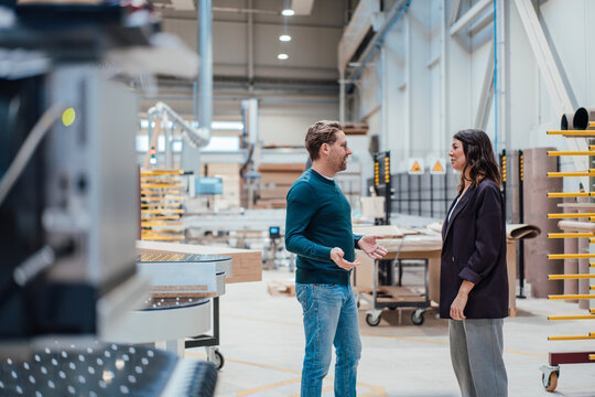Engineers discussing together in industry