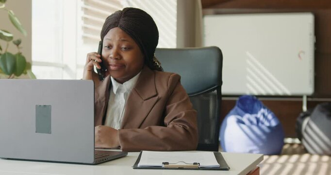 Serious support specialist resolving client issue with focus and care