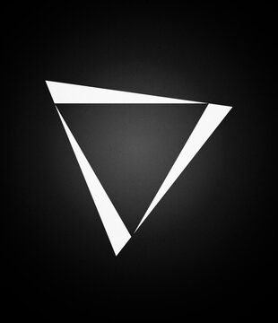 Abstract white geometric triangle illustration on dark background