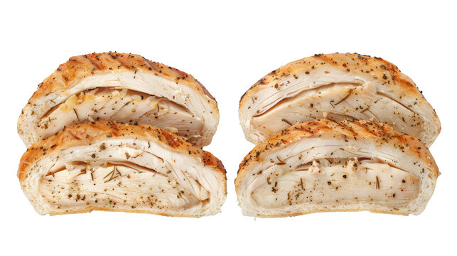 Grilled chicken breast sandwich cut in half, juicy meat texture isolated on transparent background