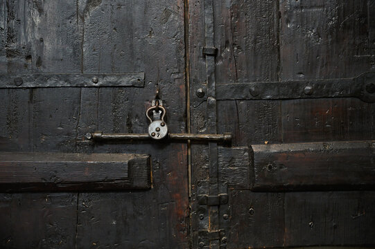 Door made of black wood panels