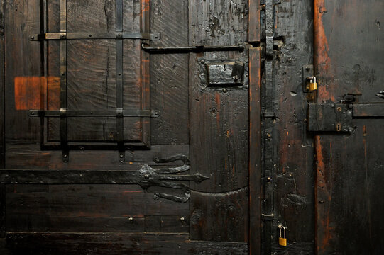 Door made of black wood panels