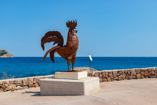 Cala Agulla, Mallorca, Spain - August 3, 2025: A picture of the El Gallo sculpture at Cala Agulla.