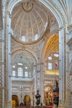Transept of Mosque Cathedral of Cordoba, Spain. Two ornate baroque pulpits, renaissance architecture, vaulted ceiling