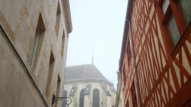 Notre Dame cathedral and half-timbered houses in Dijon, France