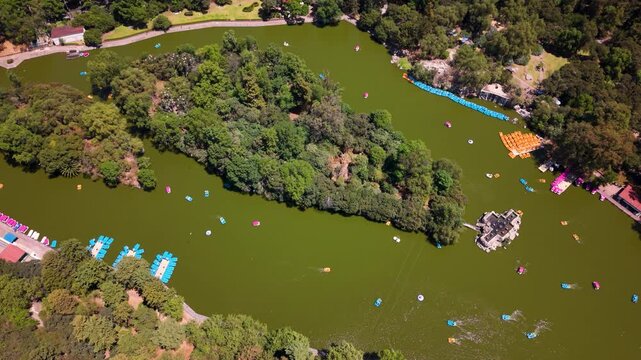 Aerial perspective of recreational lake with boats in Chapultepec