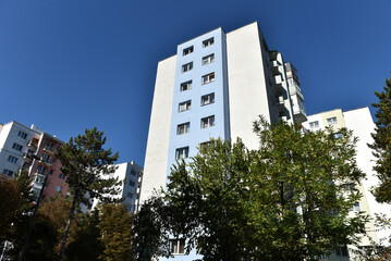 Typical facade of concrete panel building. Post Soviet flat of blocks © salajean