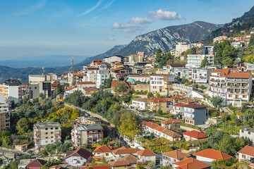 Fototapeta premium Kruje old town in Albania. Streets and traditional red tiled roofs cityscape on the mountains.