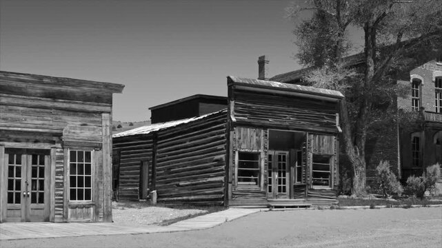 1930's style black and white film of Bannack ghost Town, Montana	, USA 